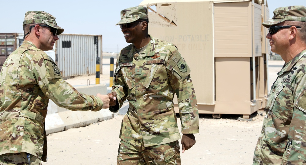 Brig. Gen. Brandon Parker coins Soldiers of Task Force Phoenix at Camp Beuhring, Kuwait