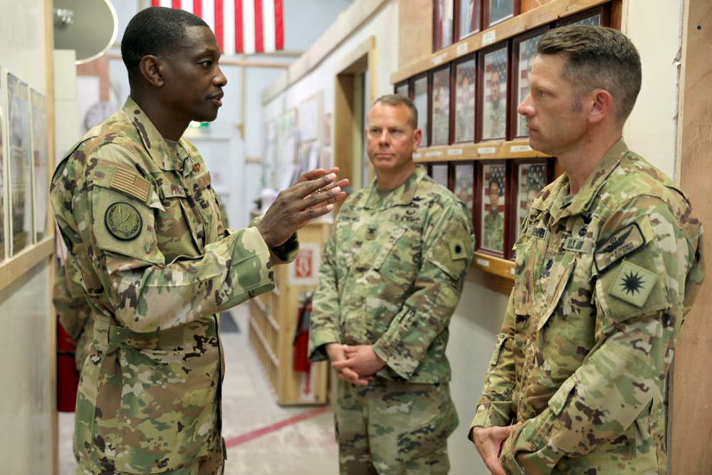 Brig. Gen. Brandon Parker coins Soldiers of Task Force Phoenix at Camp Beuhring, Kuwait