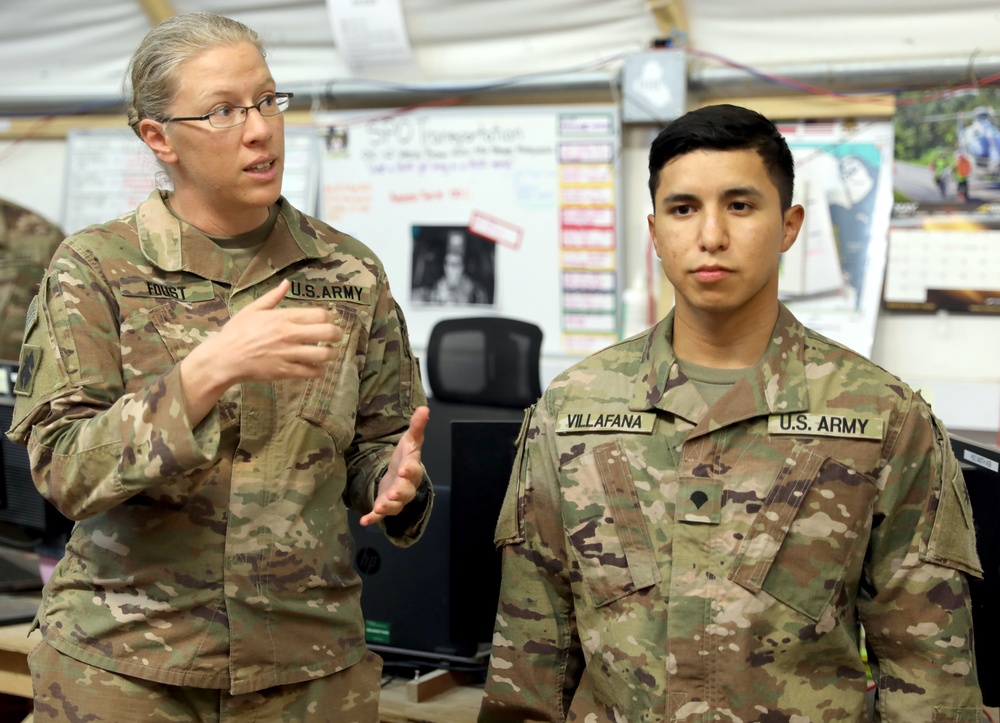 Brig. Gen. Brandon Parker coins Soldiers of Task Force Phoenix at Camp Beuhring, Kuwait