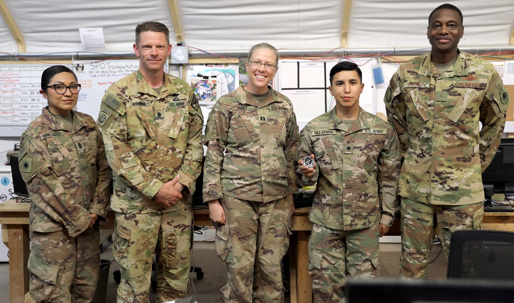 Brig. Gen. Brandon Parker coins Soldiers of Task Force Phoenix at Camp Beuhring, Kuwait