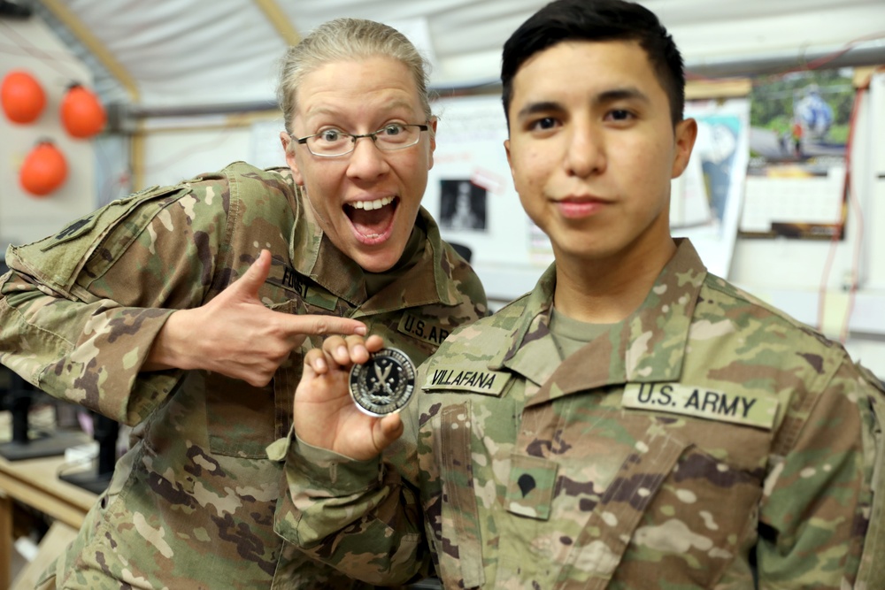 Brig. Gen. Brandon Parker coins Soldiers of Task Force Phoenix at Camp Beuhring, Kuwait