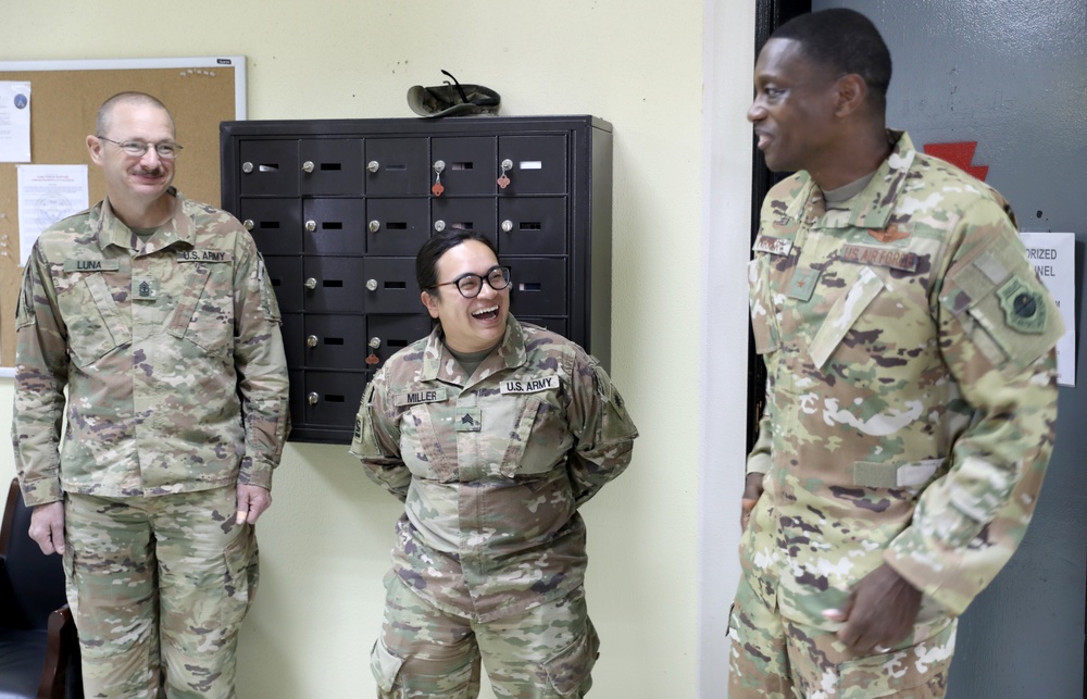 Brig. Gen. Brandon Parker coins Soldiers of Task Force Phoenix at Camp Beuhring, Kuwait