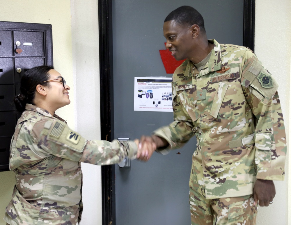 Brig. Gen. Brandon Parker coins Soldiers of Task Force Phoenix at Camp Beuhring, Kuwait