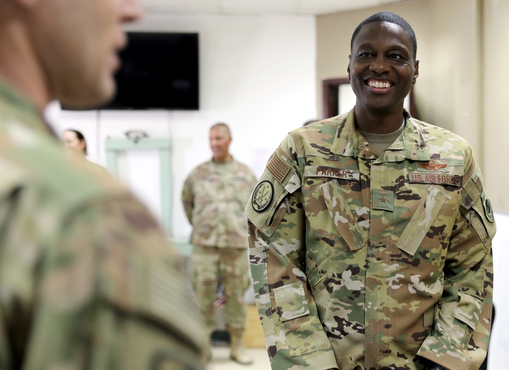 Brig. Gen. Brandon Parker coins Soldiers of Task Force Phoenix at Camp Beuhring, Kuwait