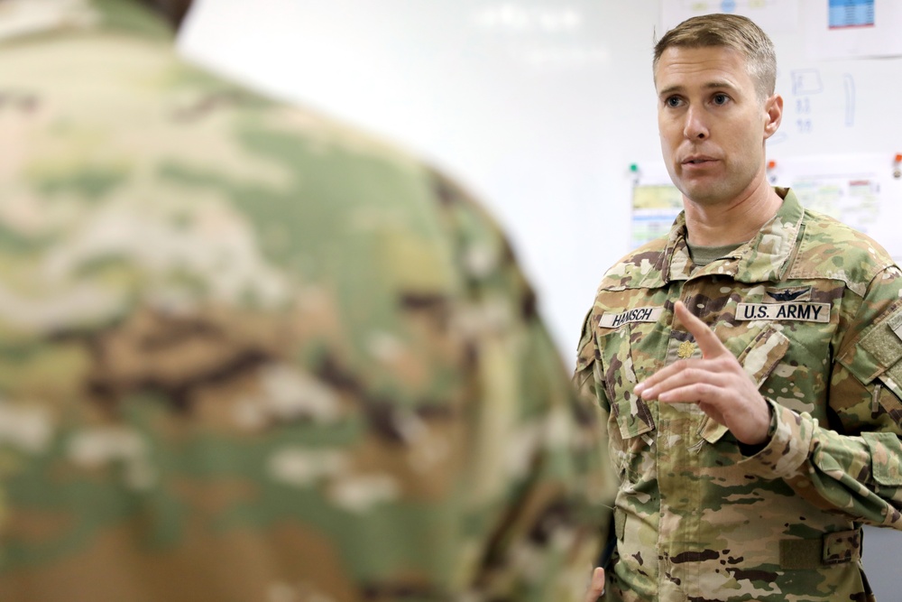 Brig. Gen. Brandon Parker coins Soldiers of Task Force Phoenix at Camp Beuhring, Kuwait