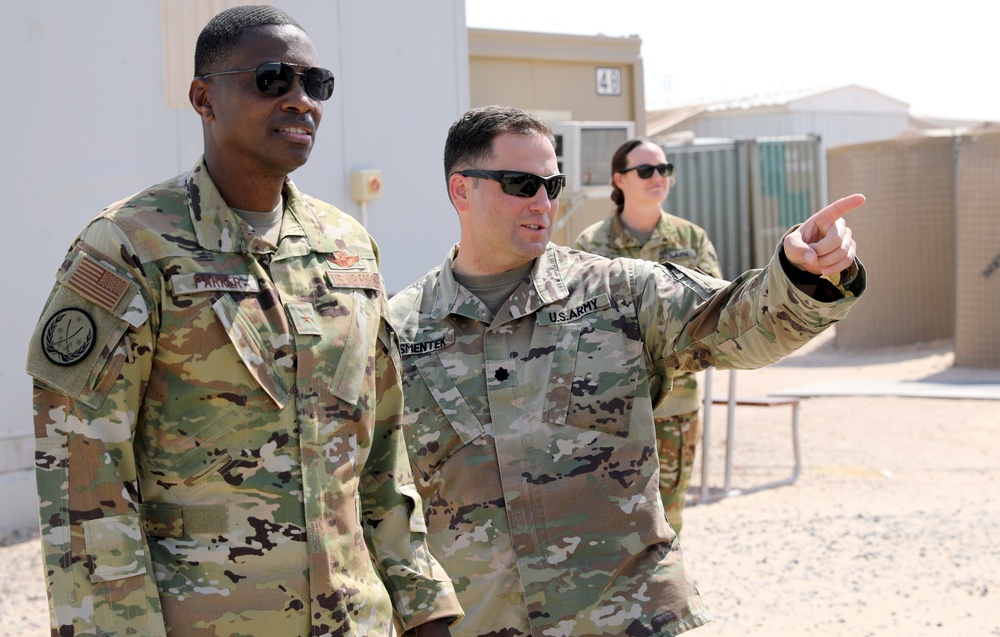 Brig. Gen. Brandon Parker coins Soldiers of Task Force Phoenix at Camp Beuhring, Kuwait