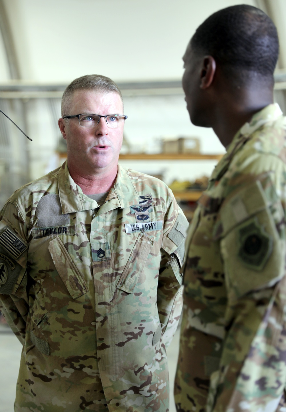 Brig. Gen. Brandon Parker coins Soldiers of Task Force Phoenix at Camp Beuhring, Kuwait