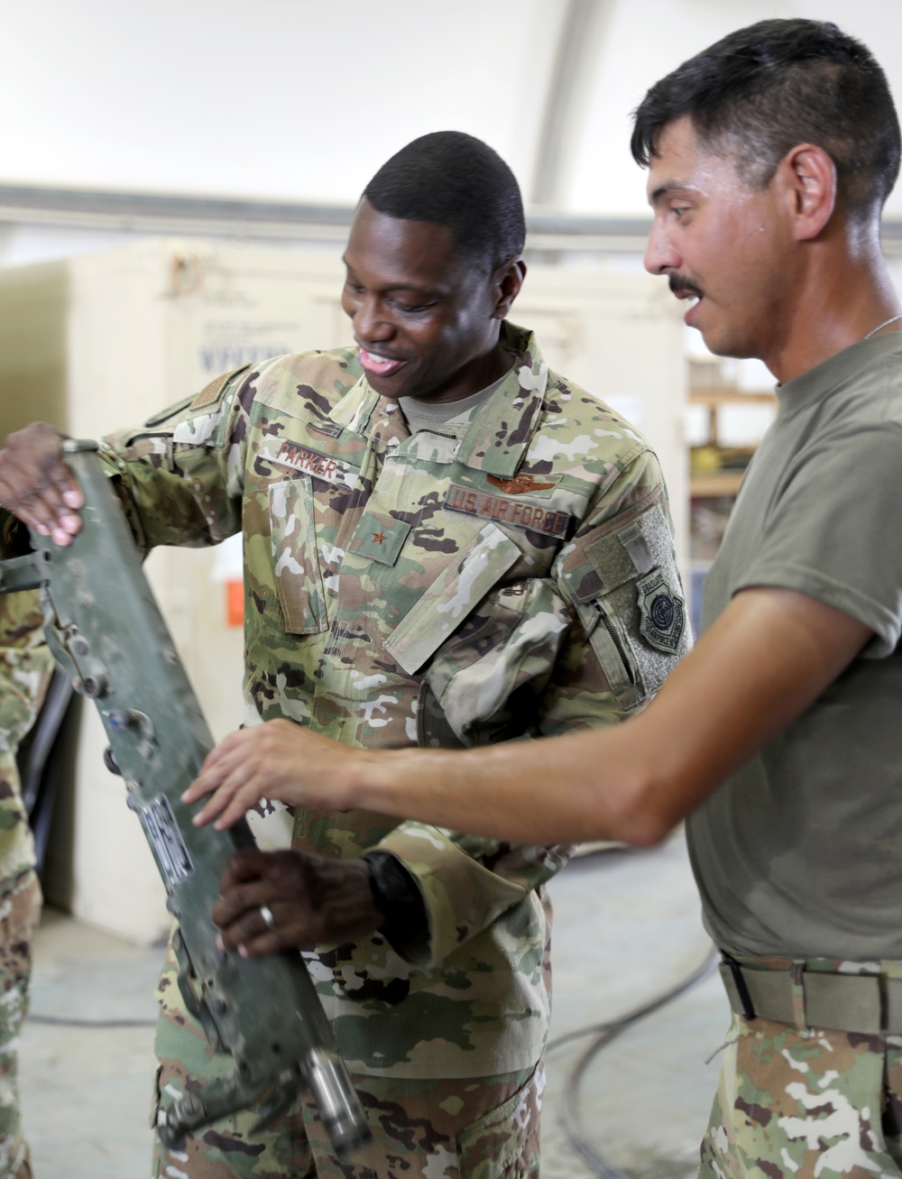 Brig. Gen. Brandon Parker coins Soldiers of Task Force Phoenix at Camp Beuhring, Kuwait