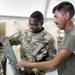 Brig. Gen. Brandon Parker coins Soldiers of Task Force Phoenix at Camp Beuhring, Kuwait