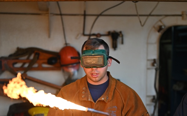 Coast Guard Cutter Ida Lewis works buoys in Narragansett Bay