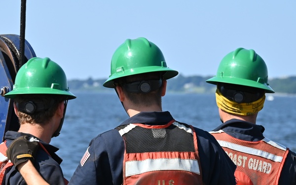Coast Guard Cutter Ida Lewis works buoys in Narragansett Bay