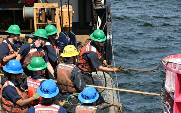 Coast Guard Cutter Ida Lewis works buoys in Narragansett Bay