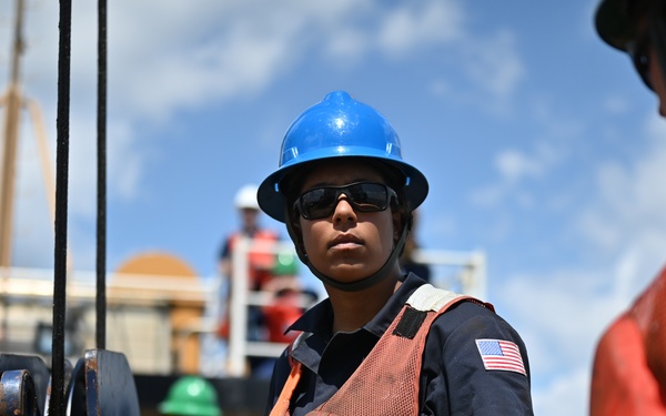 Coast Guard Cutter Ida Lewis works buoys in Narragansett Bay