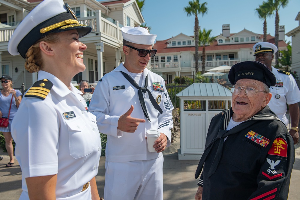 Sailors talk with WW2 Veteran