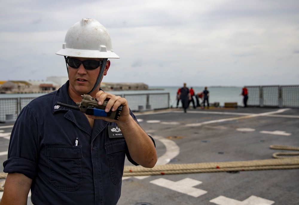 USS Billings Sailor Calls Out from His Station During Sea and Anchor Detail