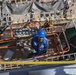 USS Billings Sailor Paints the Ship’s Hull