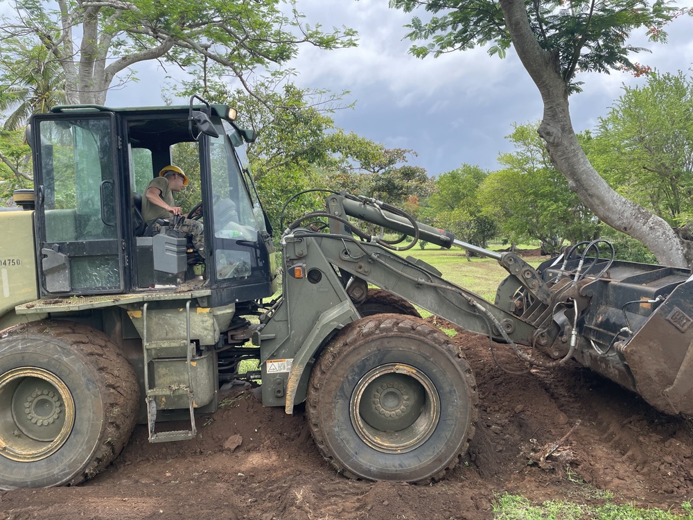 U.S. Navy Seabees with NMCB-5 and Marines with 7th ESB contribute to the community of Tinian