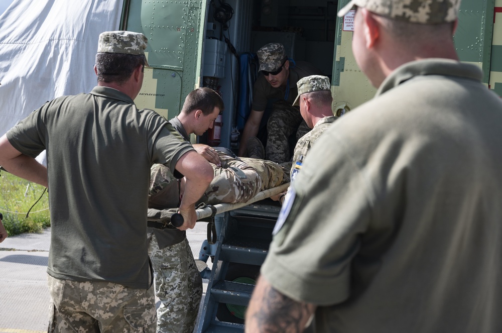 352d Special Operations Forces and Ukrainian Air Force Members Conduct Tactical Combat Casualty Care Training