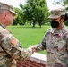 Sgt. 1st Class Dana Mister receives the Meritorious Service Medal
