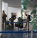 U.S. Airmen assigned to the 821st Contingency Response Group wait to board