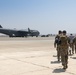 U.S. Airmen assigned to the 821st Contingency Response Group make their way to a C-17 Globemaster III