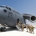 U.S. Airmen assigned to the 821st Contingency Response Group board a C-17