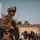 A Marine with the 24th Marine Expeditionary Unit (MEU) provides security during an evacuation at Hamid Karzai International Airport