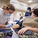 Sailors participate in a blood drive