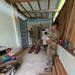 7th Engineer Support Battalion Marines build a ramp to help the local museum transport historical artifacts for cleaning, repair, and display.
