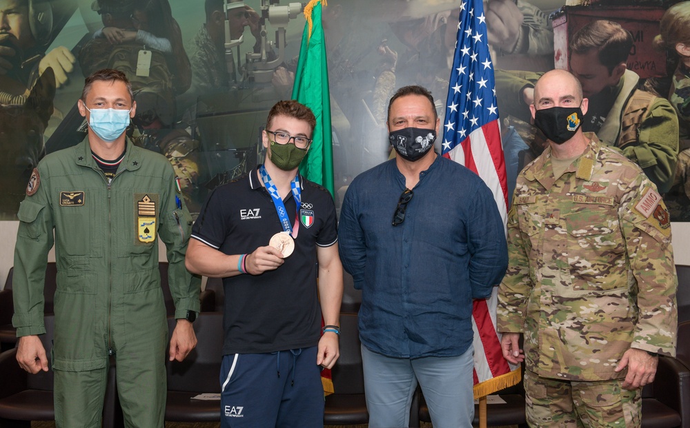 Olympic bronze weightlifting medalist visits Aviano