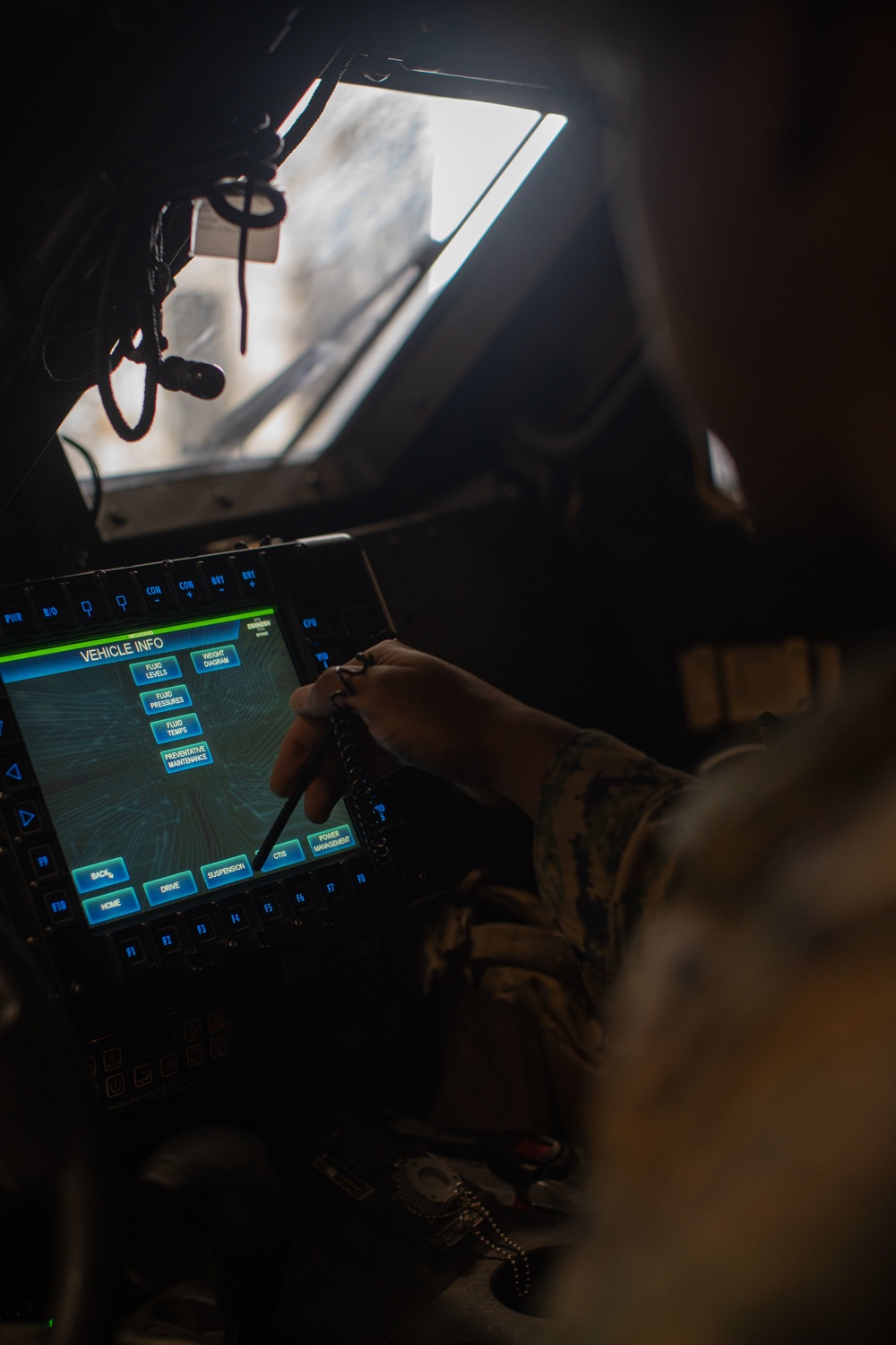 11th MEU Motor Transportation Marines Conduct Maintenance on Vehicles
