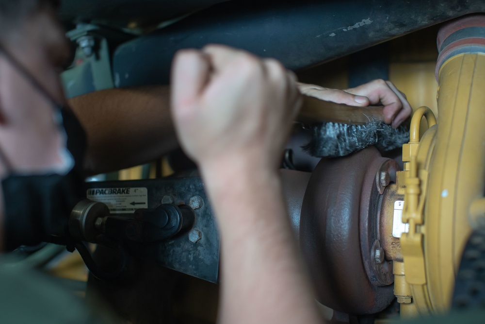11th MEU Motor Transportation Marines Conduct Maintenance on Vehicles