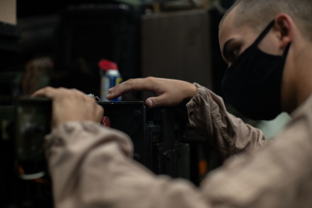 11th MEU Motor Transportation Marines Conduct Maintenance on Vehicles