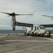 USS Arlington Sailors Place Chocks and Chains Onto a MV-22 Osprey