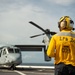 USS Arlington Sailor Stands Landing Signalman Enlisted During Flight Ops