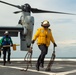 USS Arlington Sailors Remove Chocks and Chains From an MV-22 Osprey