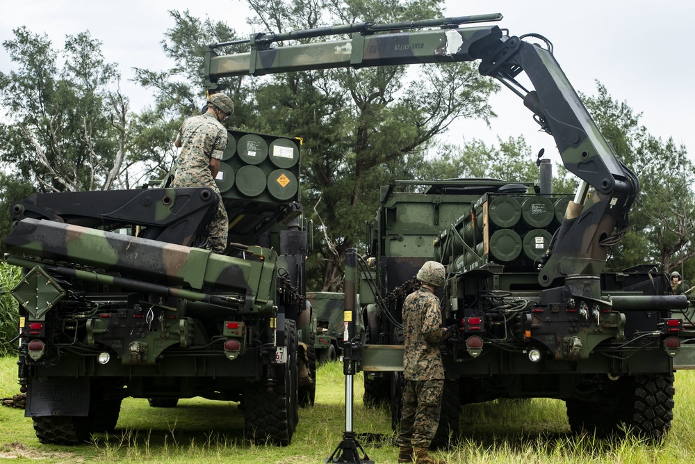 U.S. Marines transport HIMARS from USS New Orleans to Kin Blue