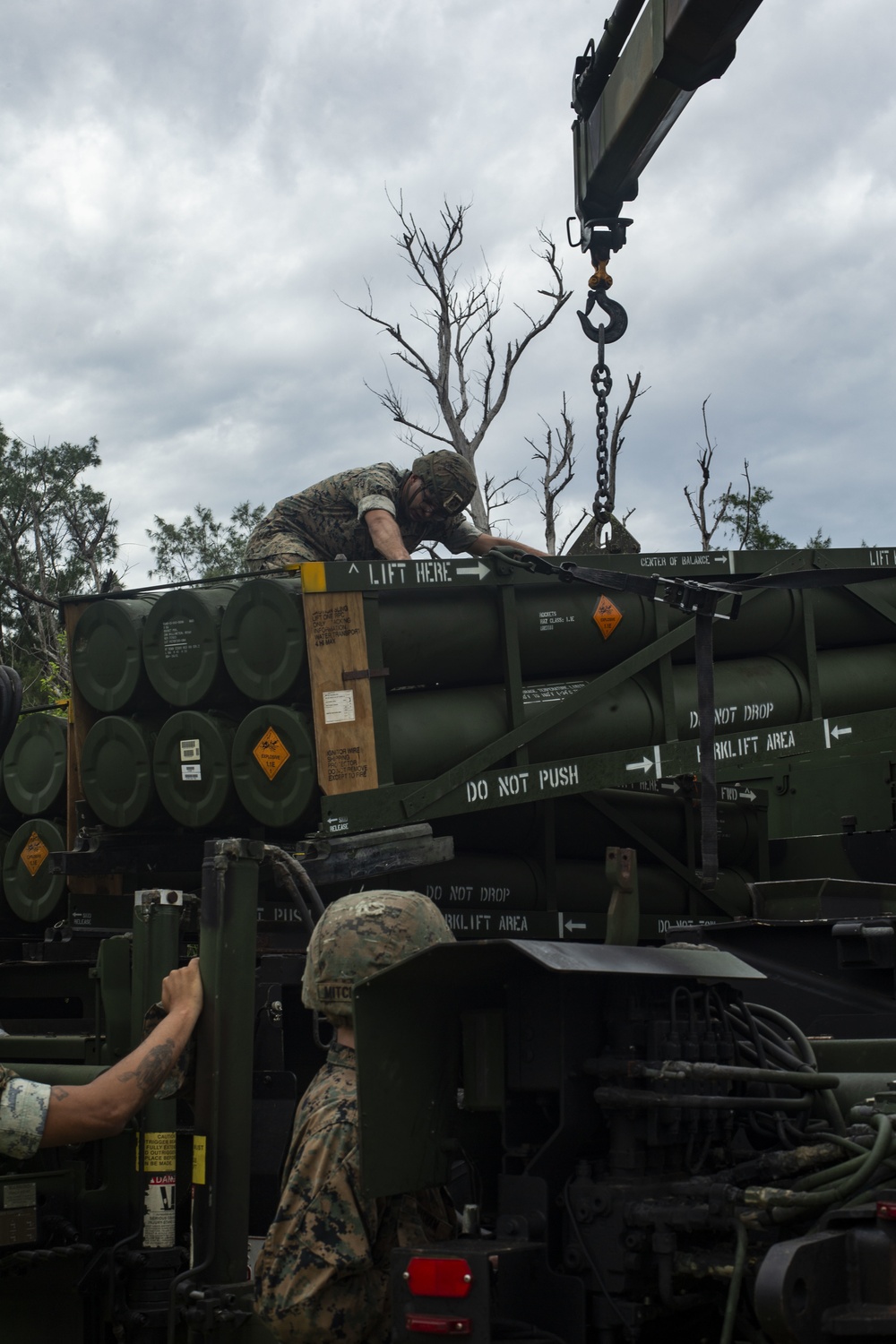U.S. Marines transport HIMARS from USS New Orleans to Kin Blue