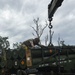 U.S. Marines transport HIMARS from USS New Orleans to Kin Blue