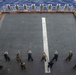 Sailors and Marines have a marksman competition on the USS America LHA 6.