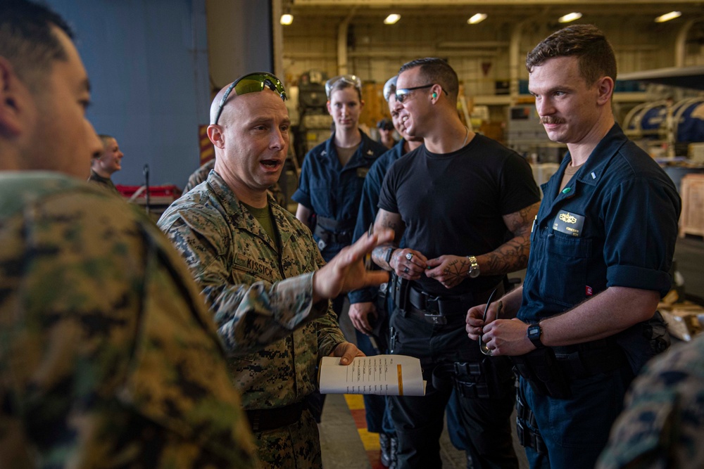 Sailors and Marines have a Marksman commpetition on the USS America LHA 6.