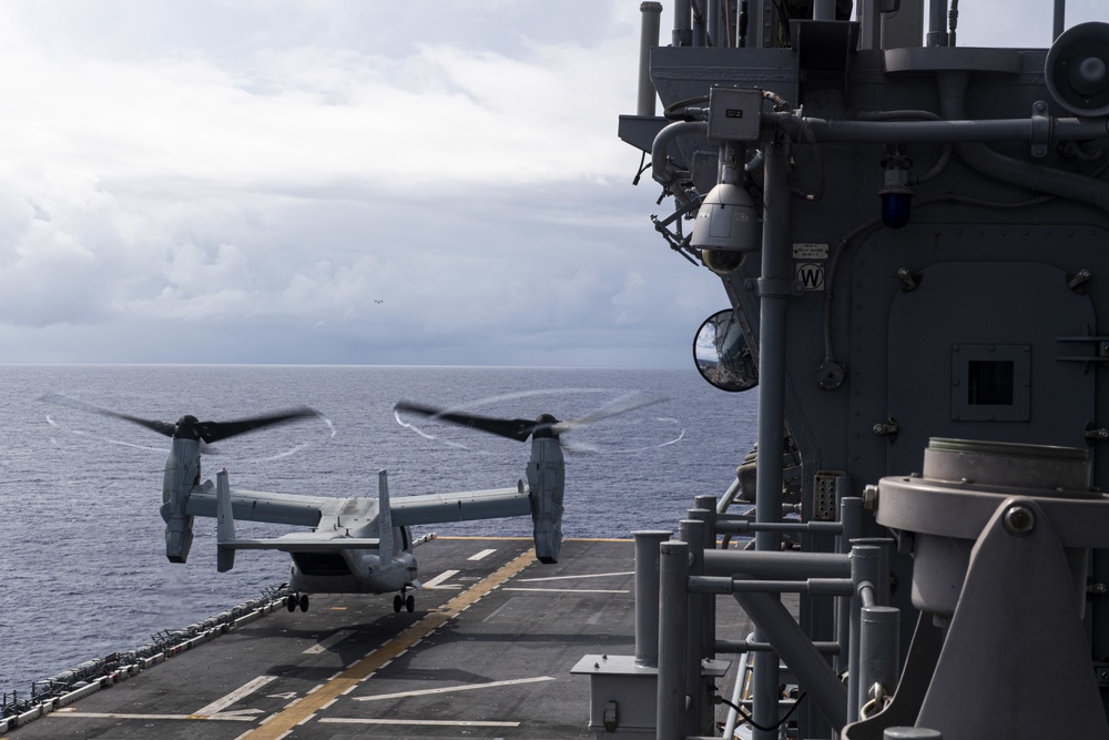 Marines assigned to the 31st Marine Expeditionary Unit take off of the forward-deployed amphibious assault ship USS America (LHA 6) for a long-range raid.