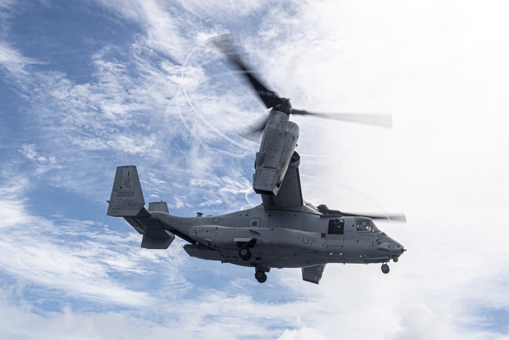 Marines assigned to the 31st Marine Expeditionary Unit take off of the forward-deployed amphibious assault ship USS America (LHA 6) for a long-range raid.