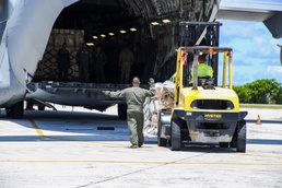 Crews Offload 18,000 Pounds of Mail At Bucholz Army Airfield