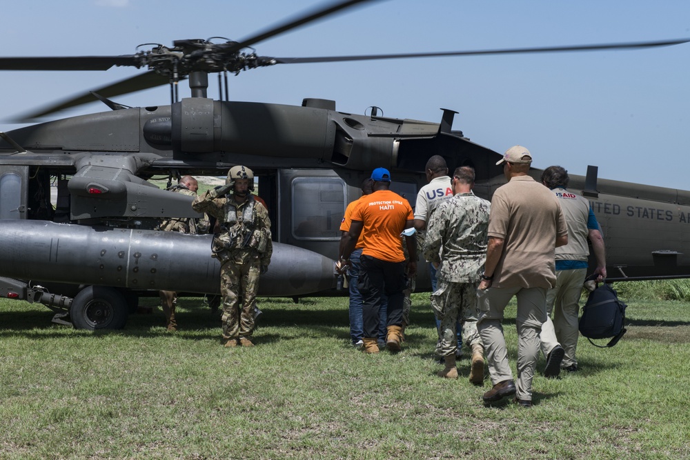 USSOUTHCOM Joint Task Force-Haiti commander visits earthquake epicenter with JTF-Bravo’s commander, 1-228th Aviation Regiment