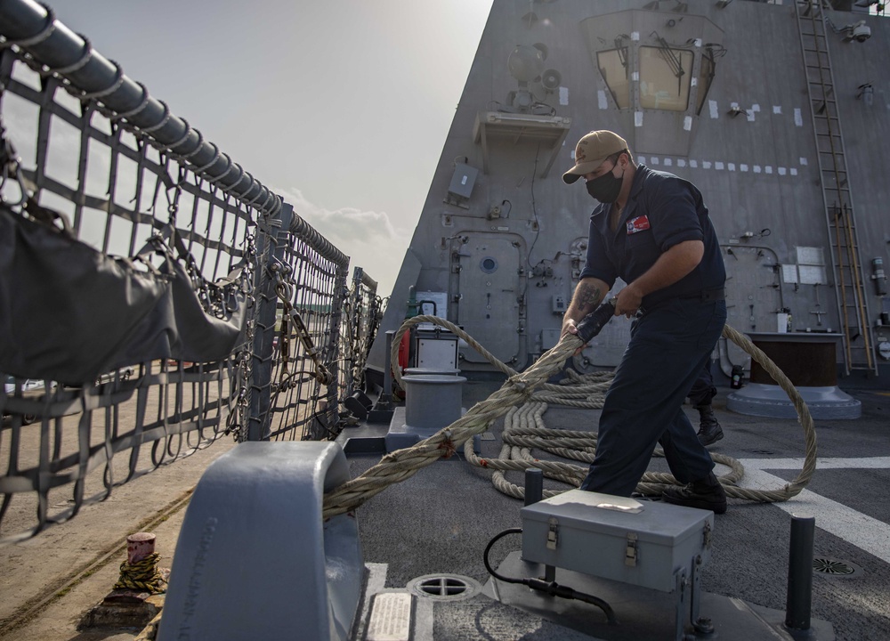 USS Billings Sailor Heaves Around a Line During Sea and Anchor Detail