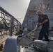 USS Billings Sailor Heaves Around a Line During Sea and Anchor Detail