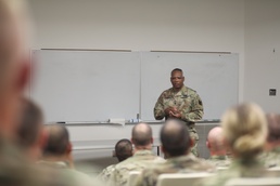 National Guard command sergeant major Command Sgt. Maj. John Sampa talks to officer candidates at Camp Rapid, Rapid City, SD.