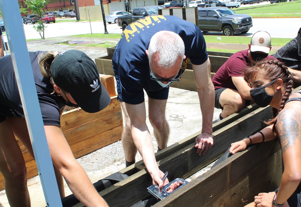 Guam Based Sailors and Visiting Marines Volunteer at Community Garden