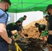 Guam Based Sailors and Visiting Marines Volunteer at Community Garden